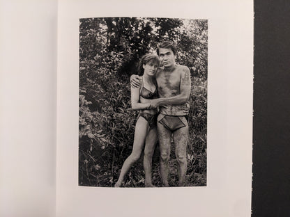 Interior photo from Cheryomushki: black-and-white portrait of a couple standing together in swimwear, outdoors.