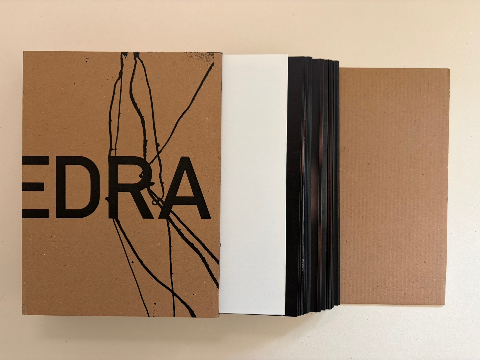 Cidade de Pedra by Antoine d'Agata, slipcase opened to reveal the folded book block.