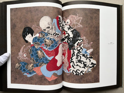 Open spread from Coffin of a Chimera with a red-haired figure and skeletal chimera imagery.