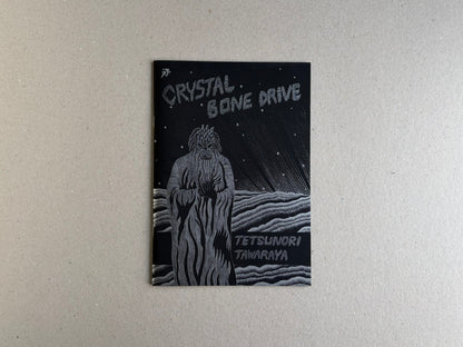 Front cover of Crystal Bone Drive by Tetsunori Tawaraya, with a silver-ink figure under cosmic rays
