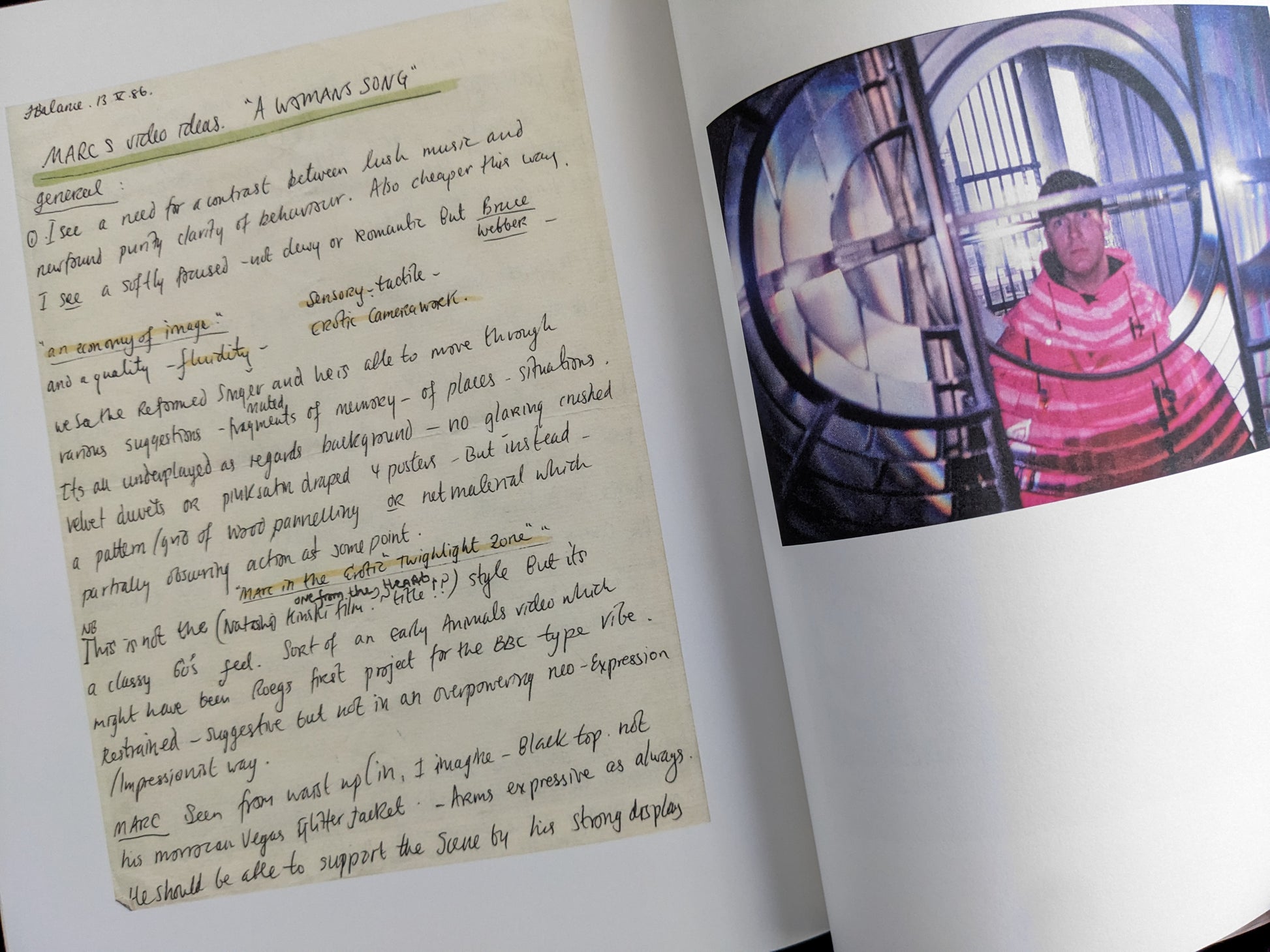 Page with handwritten video concept notes and a color photograph of John Balance inside a large optical lens.