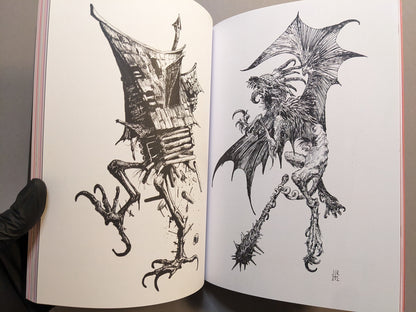 Interior spread with intricate black-ink drawings: a winged bestial creature and a house-like golem figure.