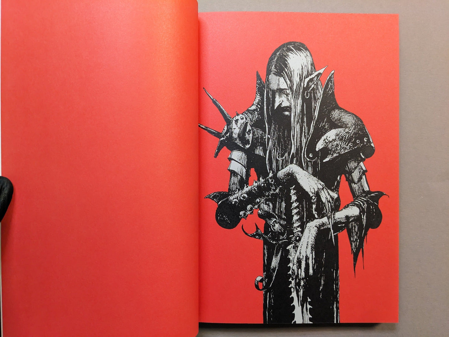 Interior red endpaper with black line illustration from the dark-fantasy artbook Cursed Swords.