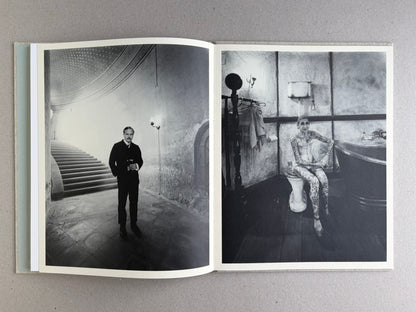 Black-and-white spread with a man standing in a stairwell on the left and a woman seated in a bathroom on the right in Dear God, the Parthenon is still broken.