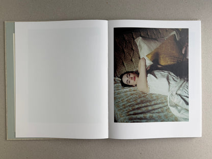 Open spread with a colour photograph on the right page and a blank left page in Dear God, the Parthenon is still broken.