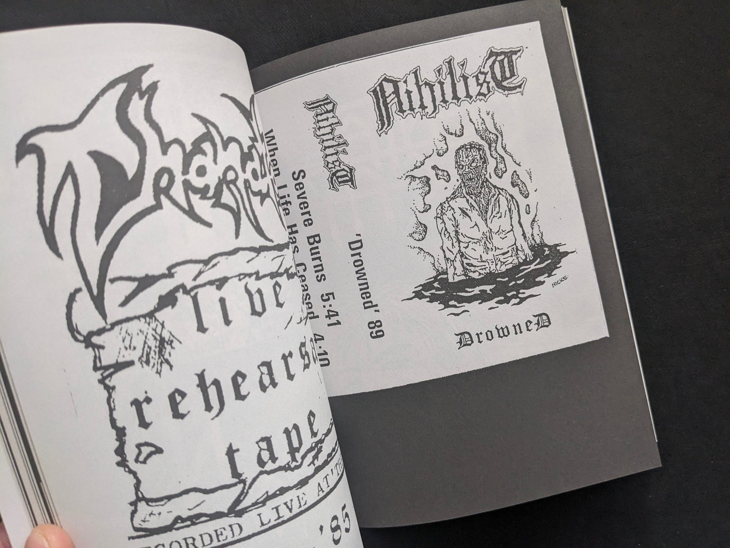 Interior spread with a cassette cover-style layout, logo, and monochrome illustration.