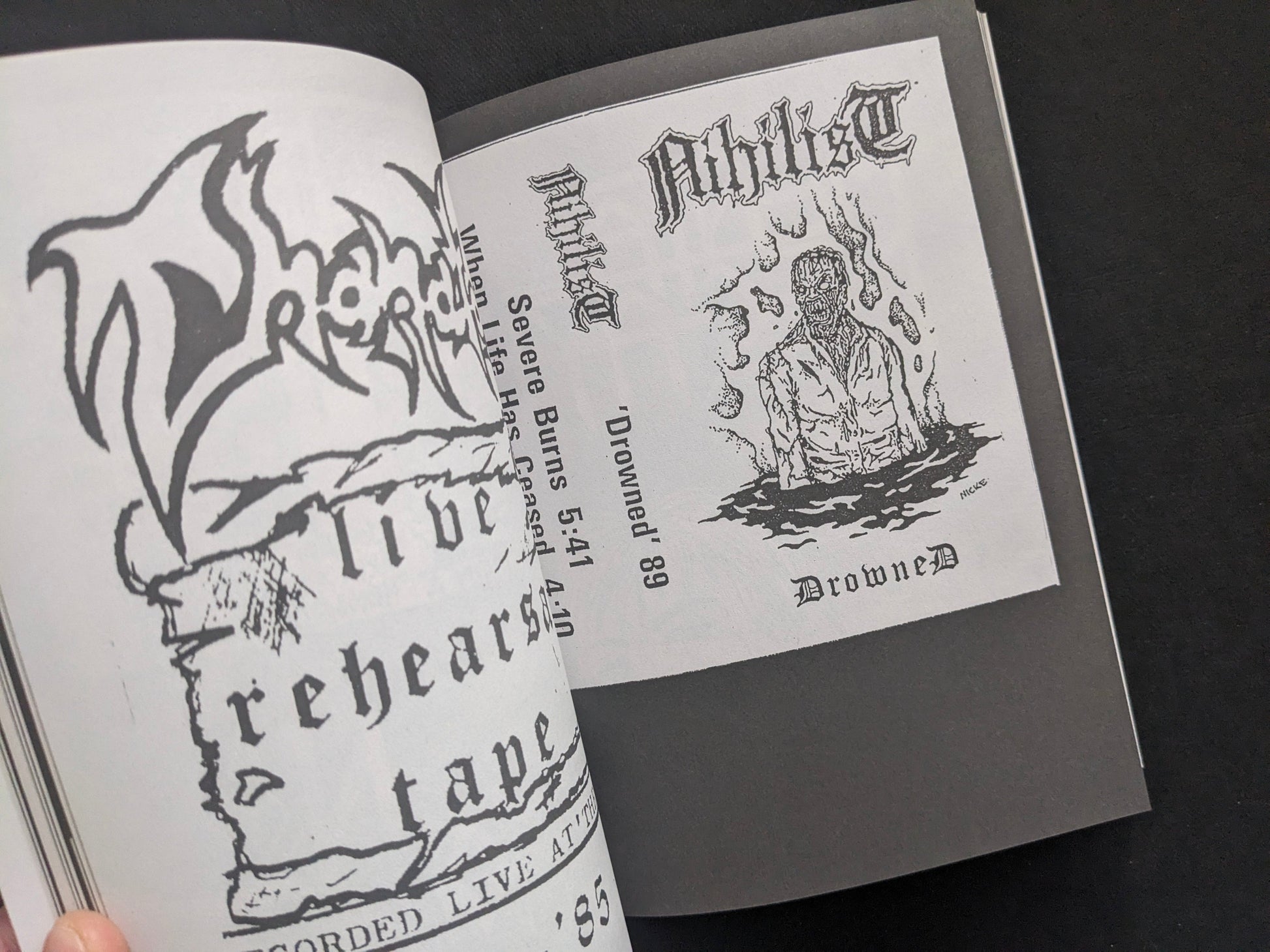 Interior spread with a cassette cover-style layout, logo, and monochrome illustration.