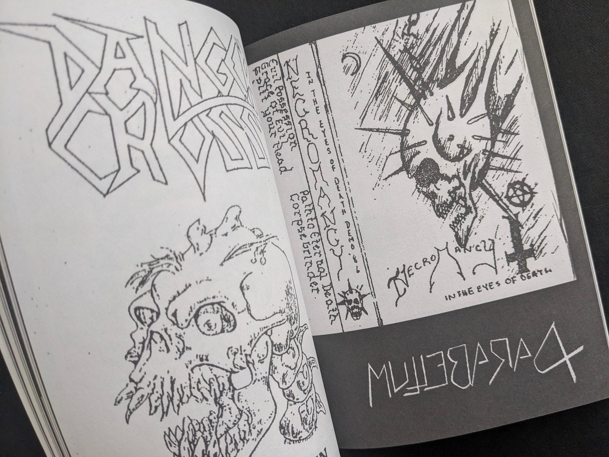 Interior close-up of logos and xeroxed graphics in a collage layout.