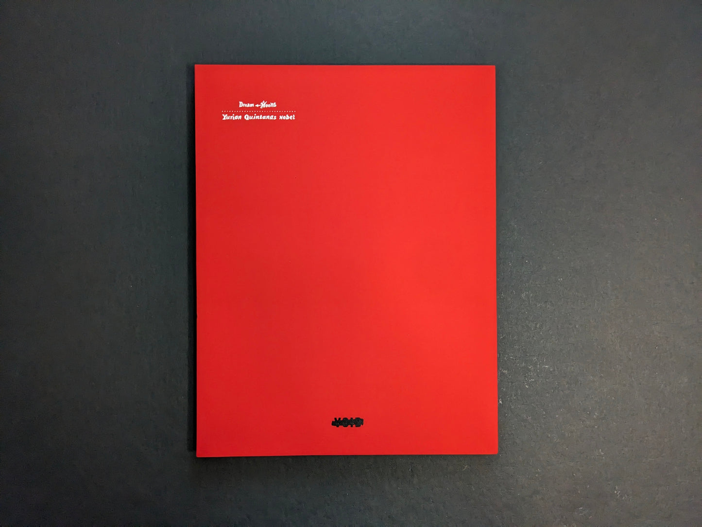 Back cover of “Dream Moons” by Yurian Quintanas Nobel (Void), plain red with small title text and MACK logo.
