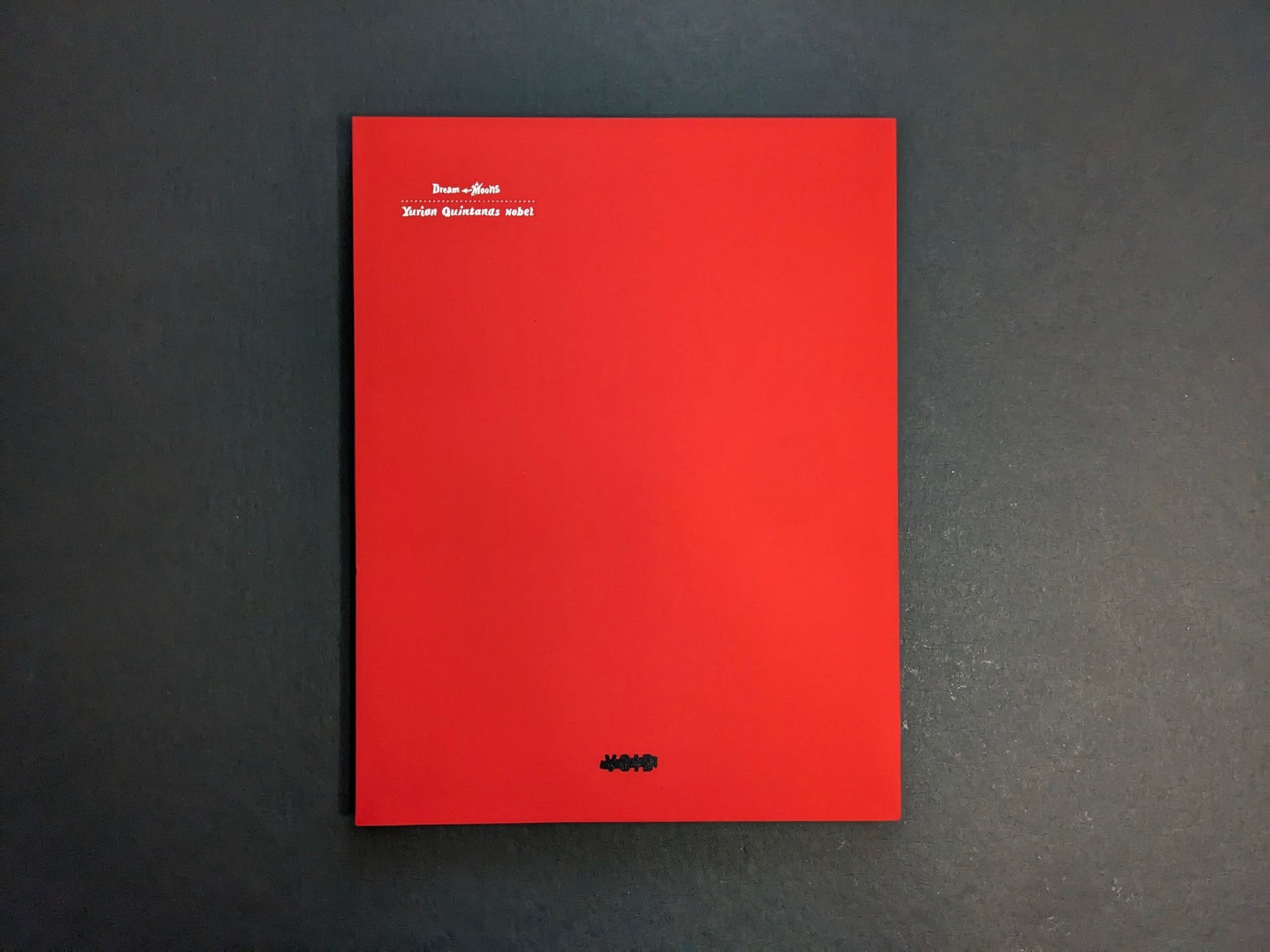 Back cover of “Dream Moons” by Yurian Quintanas Nobel (Void), plain red with small title text and MACK logo.