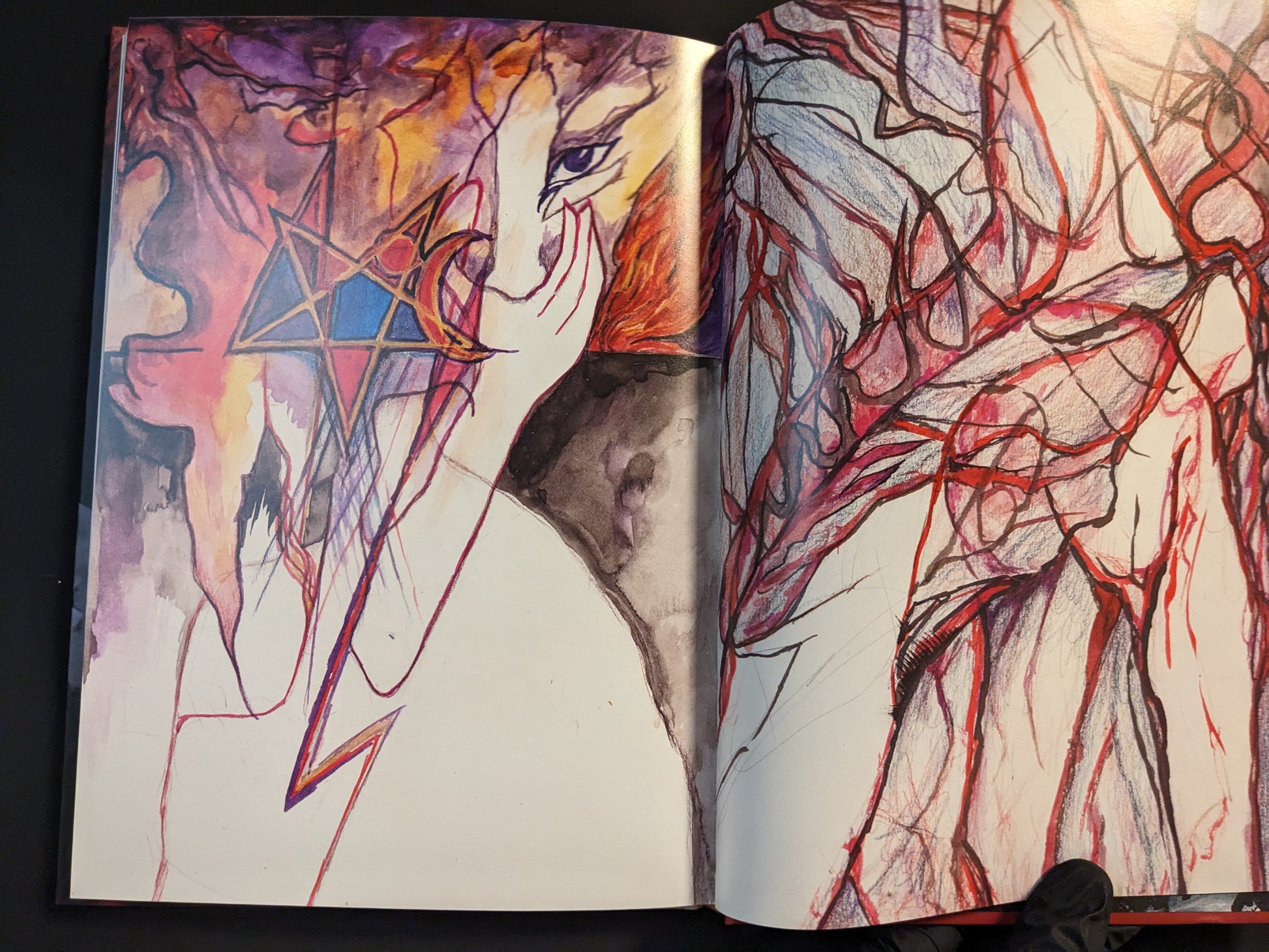 Abstract figure with red and black elements and ritual motifs