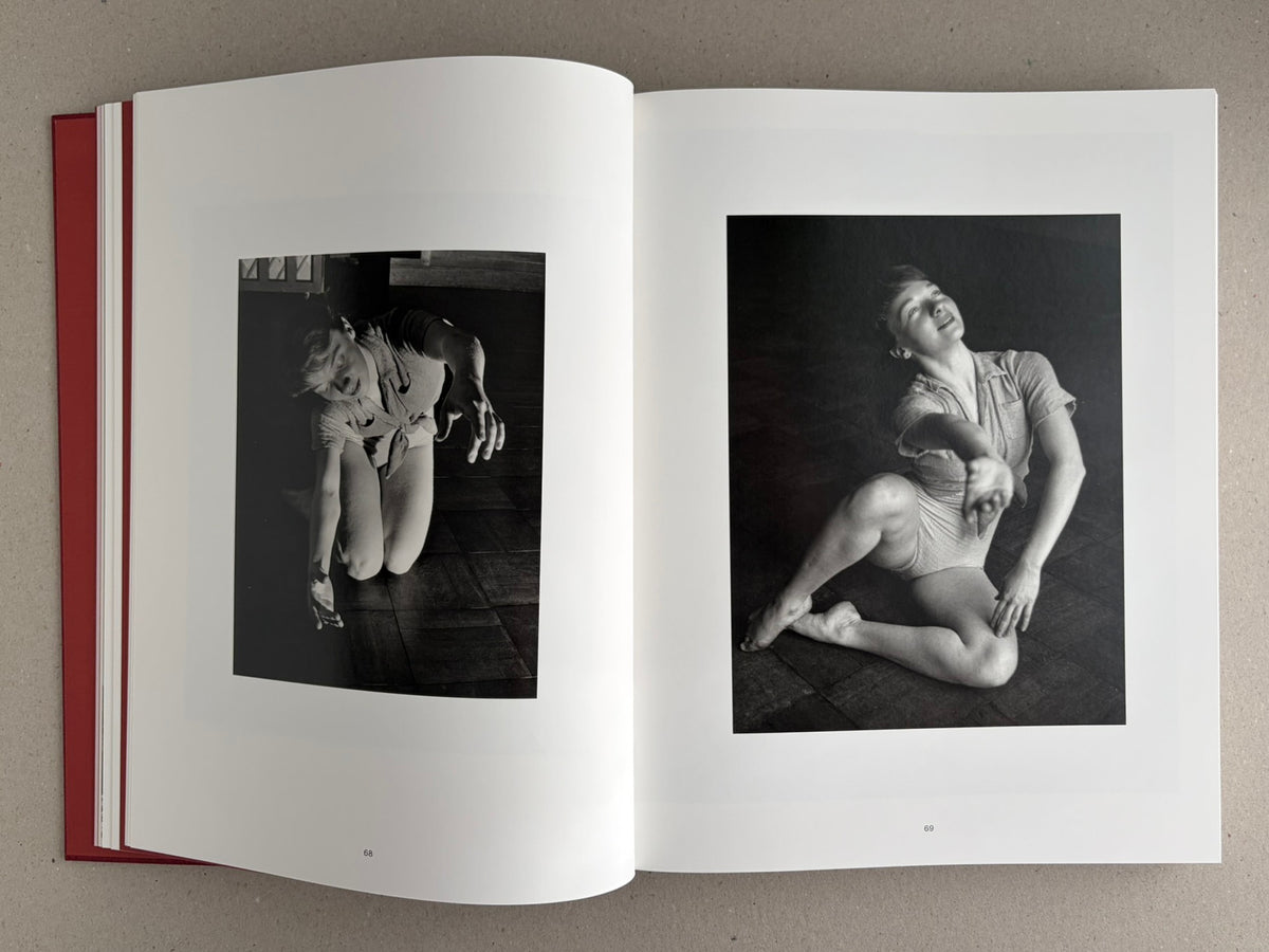 Eikoh Hosoe monograph, open to a two-page black-and-white spread with two dance photographs and page numbers 68–69.