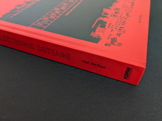 Close-up detail of the red book spine of Electronic Cottage showing the title, Hal McGee, and the Korm Plastics logo.