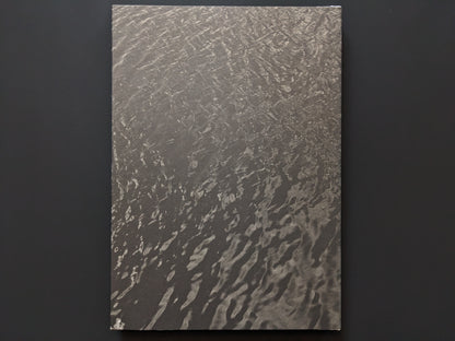 Back cover with subtle water texture from ELV by Massimo Leardini