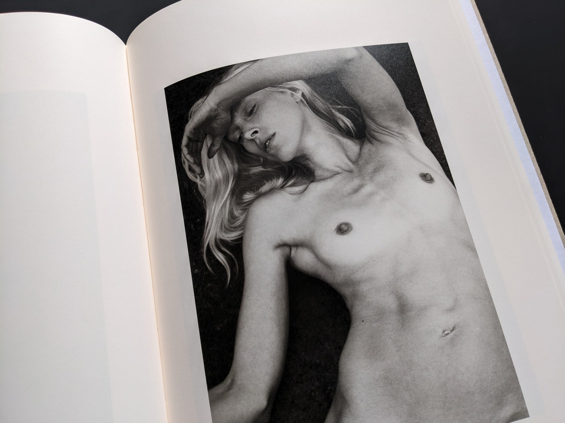 Monochrome portrait of a reclining nude woman from ELV by Massimo Leardini