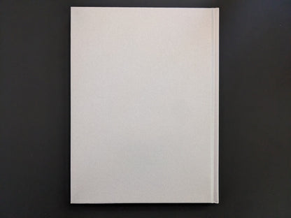 Back cover of Eros Lost by Seiji Kurata, embossed hardcover from Zen Foto Gallery.