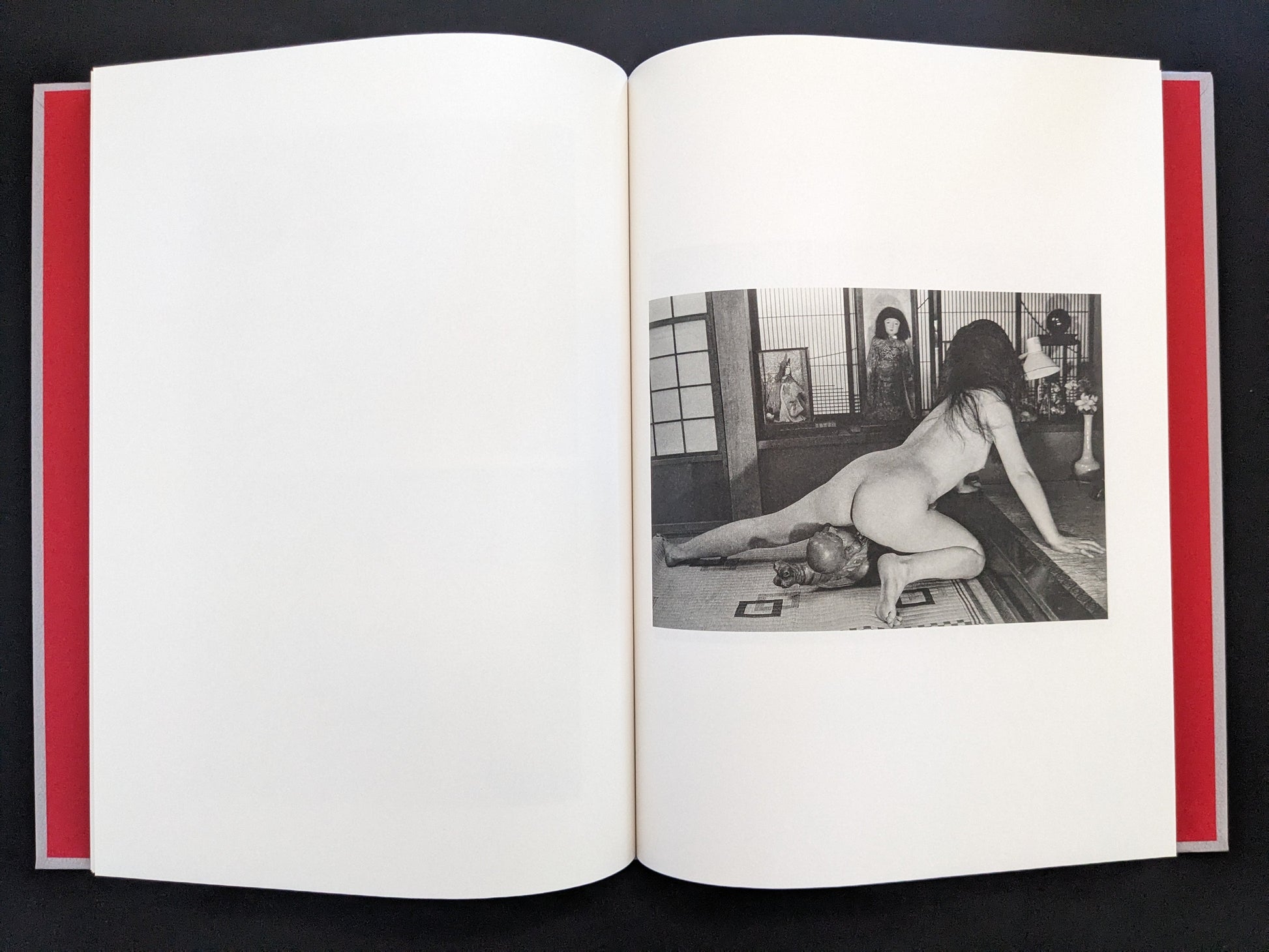 Female nude staged in Japanese tatami room with dolls, from Seiji Kurata’s Eros Lost.