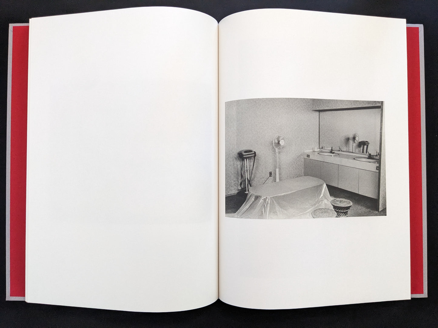 Black and white photo of furnished Japanese interior from Seiji Kurata’s Eros Lost.