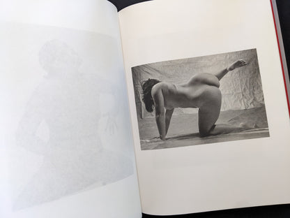 Female nude photograph staged against fabric background from Seiji Kurata’s Eros Lost.