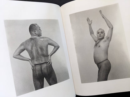 Open spread showing two black-and-white nude portraits in Eros Lost by Seiji Kurata.