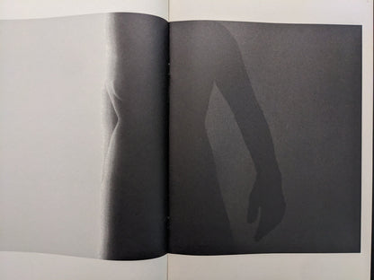 Abstract silhouette of a hand in Far East Obsession photobook by Mark Pearson.