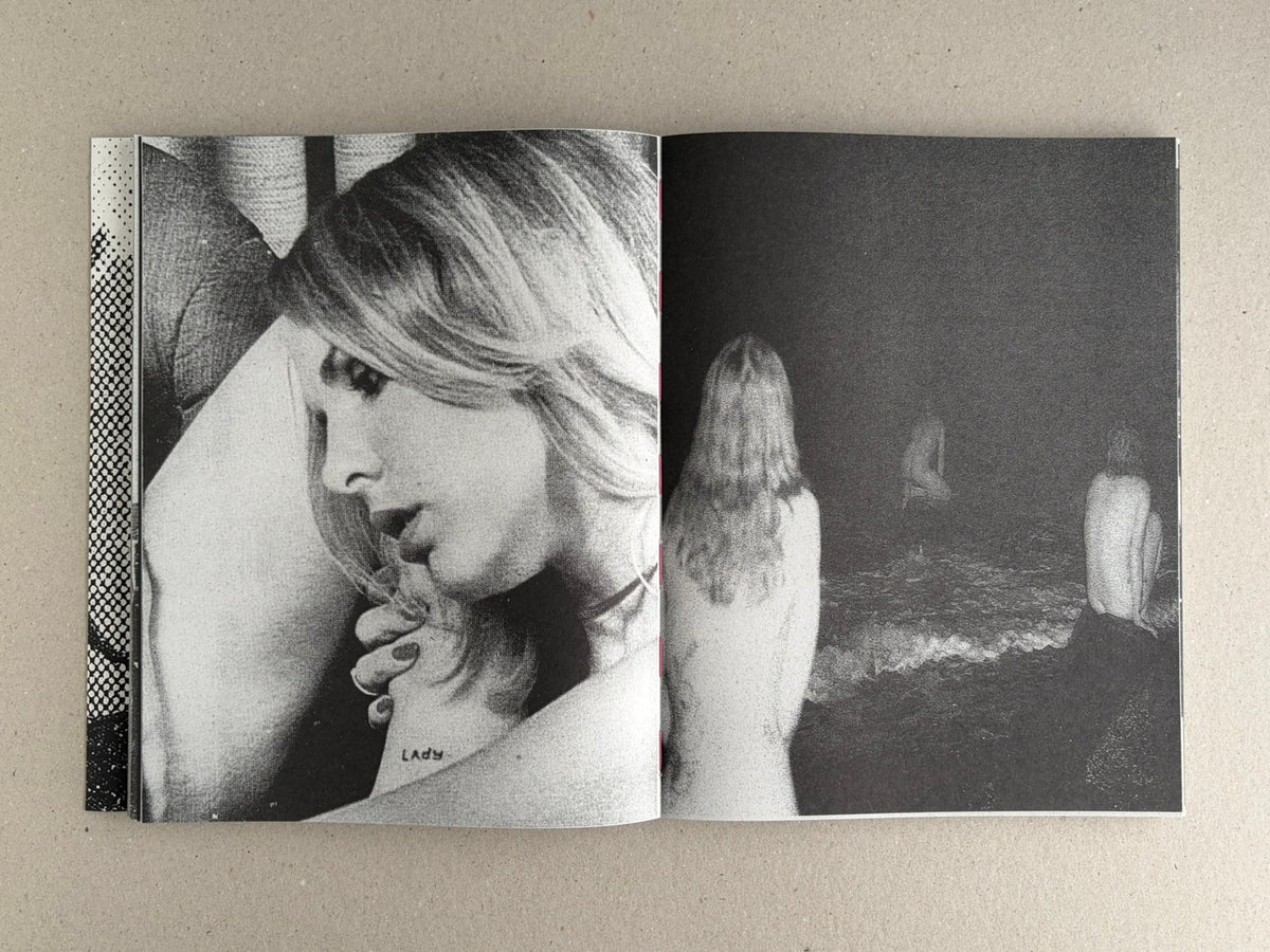 Fishworm by Pia Paulina Guilmoth and Jesse Bull Saffire, open to a black-and-white spread with a close portrait on the left and figures by the water at night on the right.