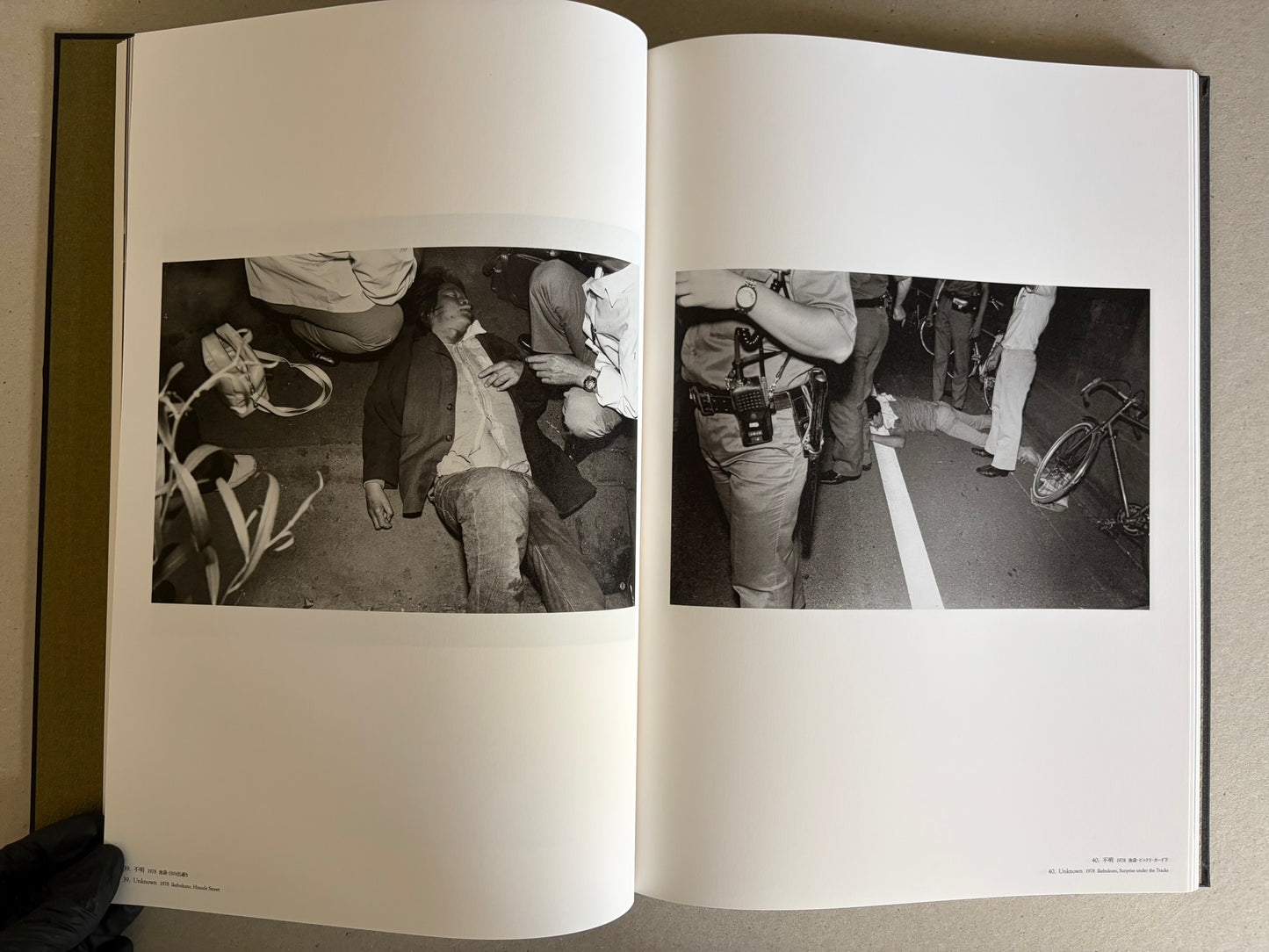 Flash Up by Seiji Kurata, open spread with two black-and-white street photographs