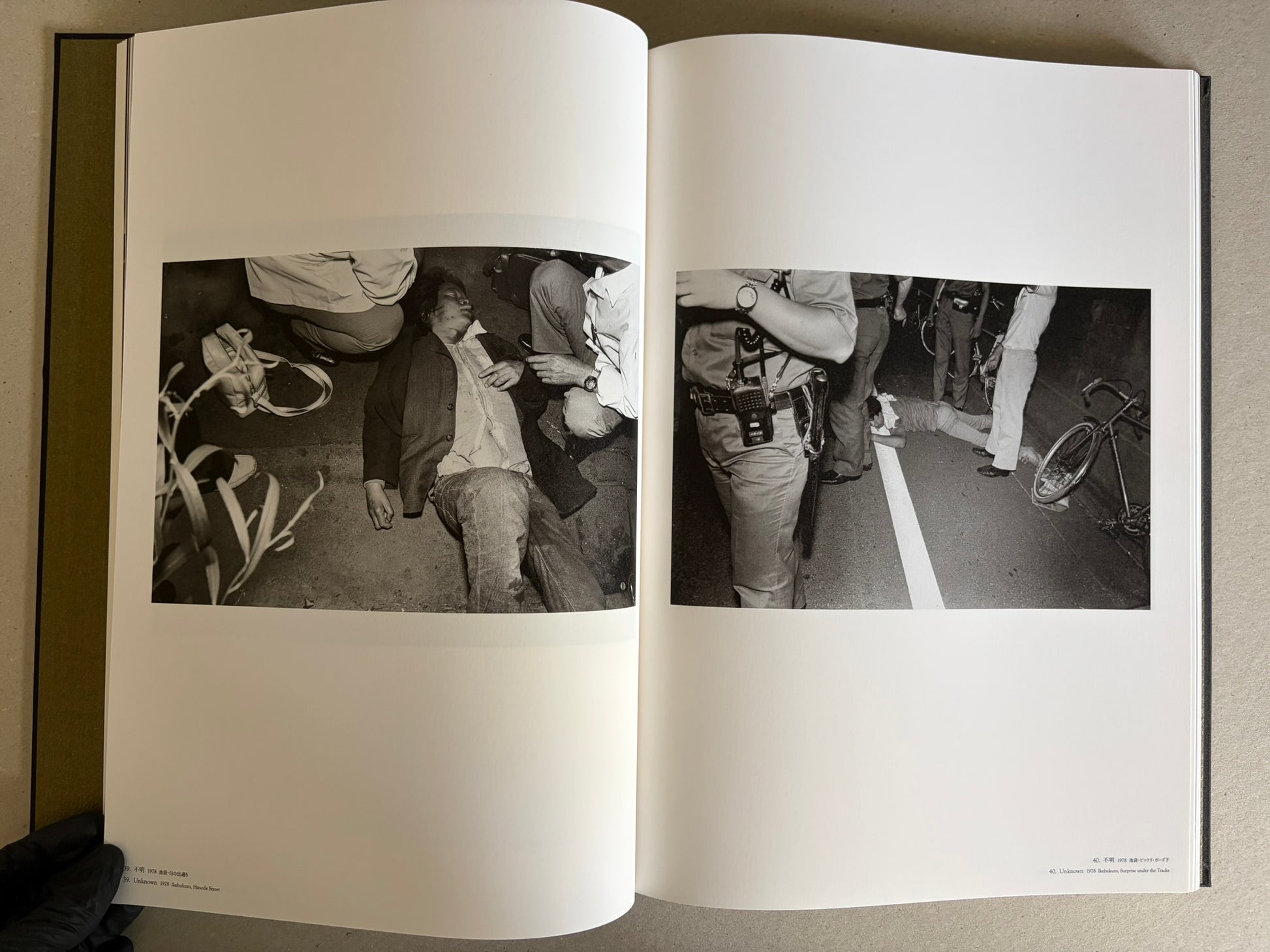 Flash Up by Seiji Kurata, open spread with two black-and-white street photographs