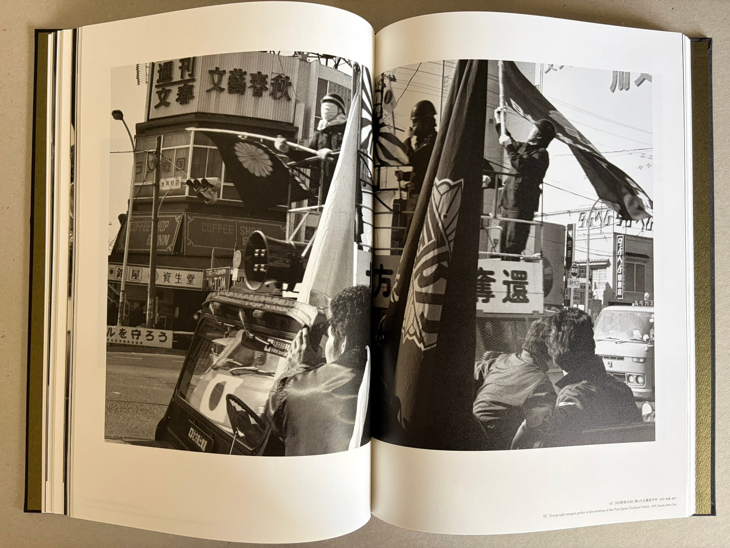 Flash Up by Seiji Kurata, open spread with a tattooed man and a woman in a doorway
