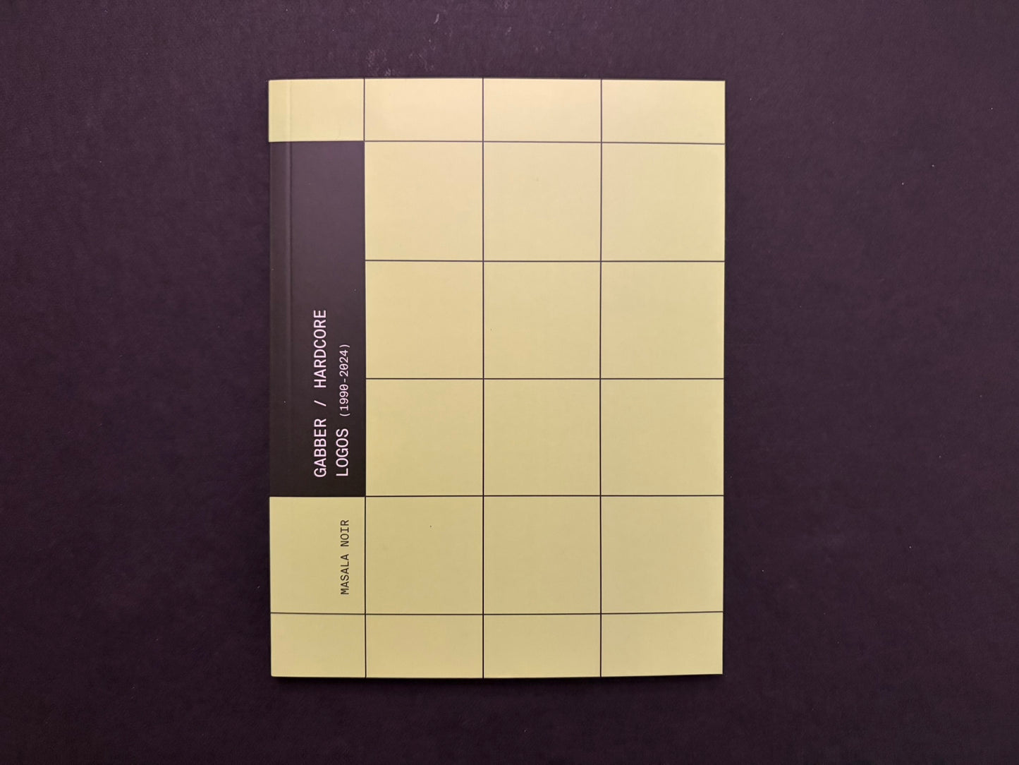 Gabber / Hardcore Logos (1990–2024) cover on a dark background, with a cream grid design and a black spine band reading Masala Noir.