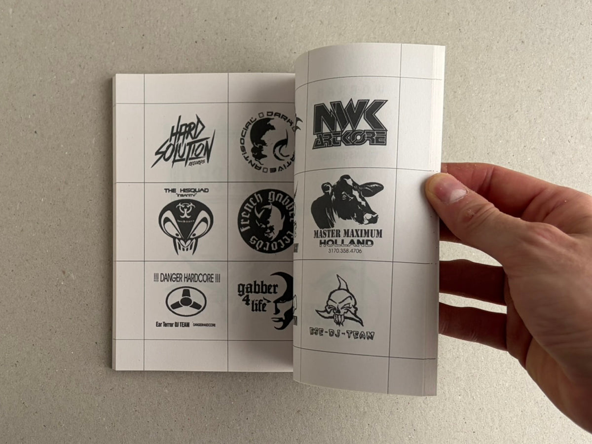 Gabber / Hardcore Logos (1990–2024) open to interior pages with techno and hardcore logo marks, held open by a hand