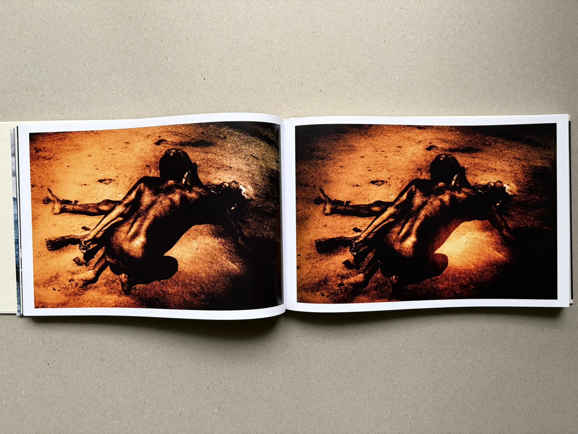 Genocídio do Yanomami by Claudia Andujar, open spread with a single figure on both pages