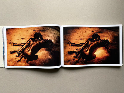 Genocídio do Yanomami by Claudia Andujar, open spread with a single figure on both pages