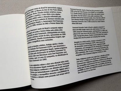 Genocídio do Yanomami by Claudia Andujar, text spread with Portuguese and English paragraphs