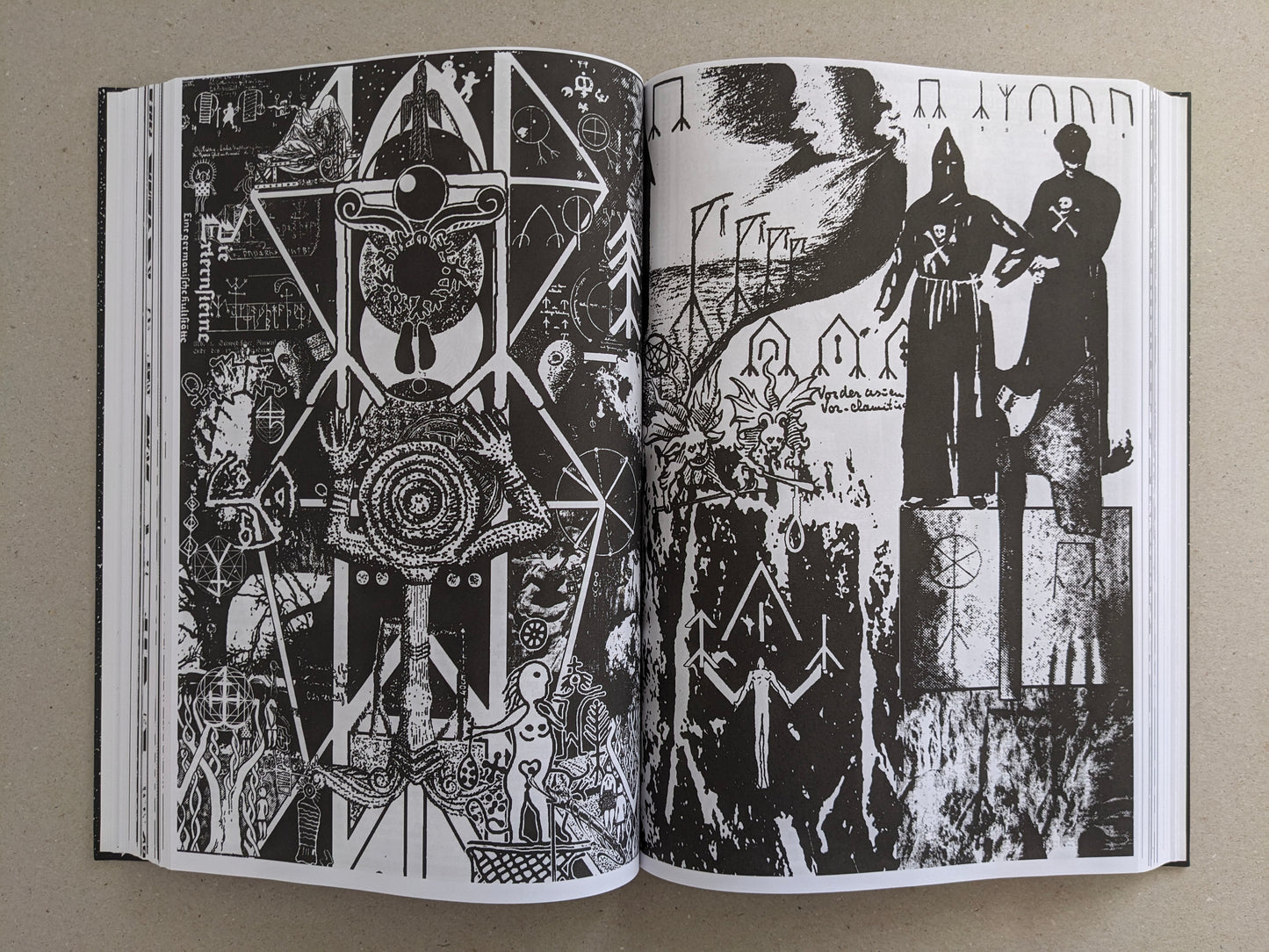 Inside spread with high-contrast collage imagery and symbol-like graphics in black and white.