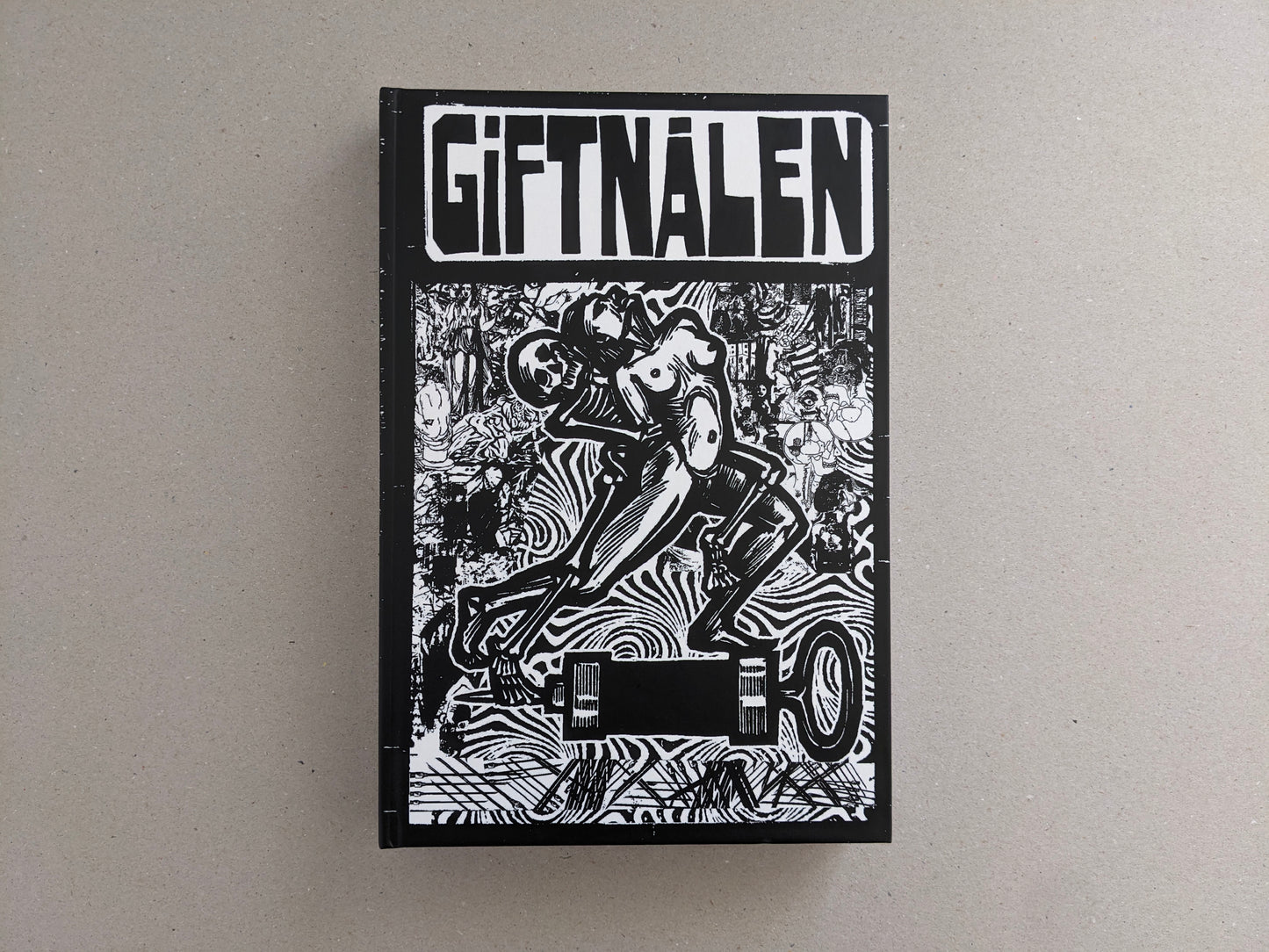 Front cover of GIFTNÅLEN no 1 by Kristian Olsson, black-and-white illustration on a black background.
