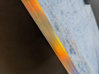 Close-up of Glass Mountain by Michael Lundgren showing gilded page edges and dotted foil detail on the cover