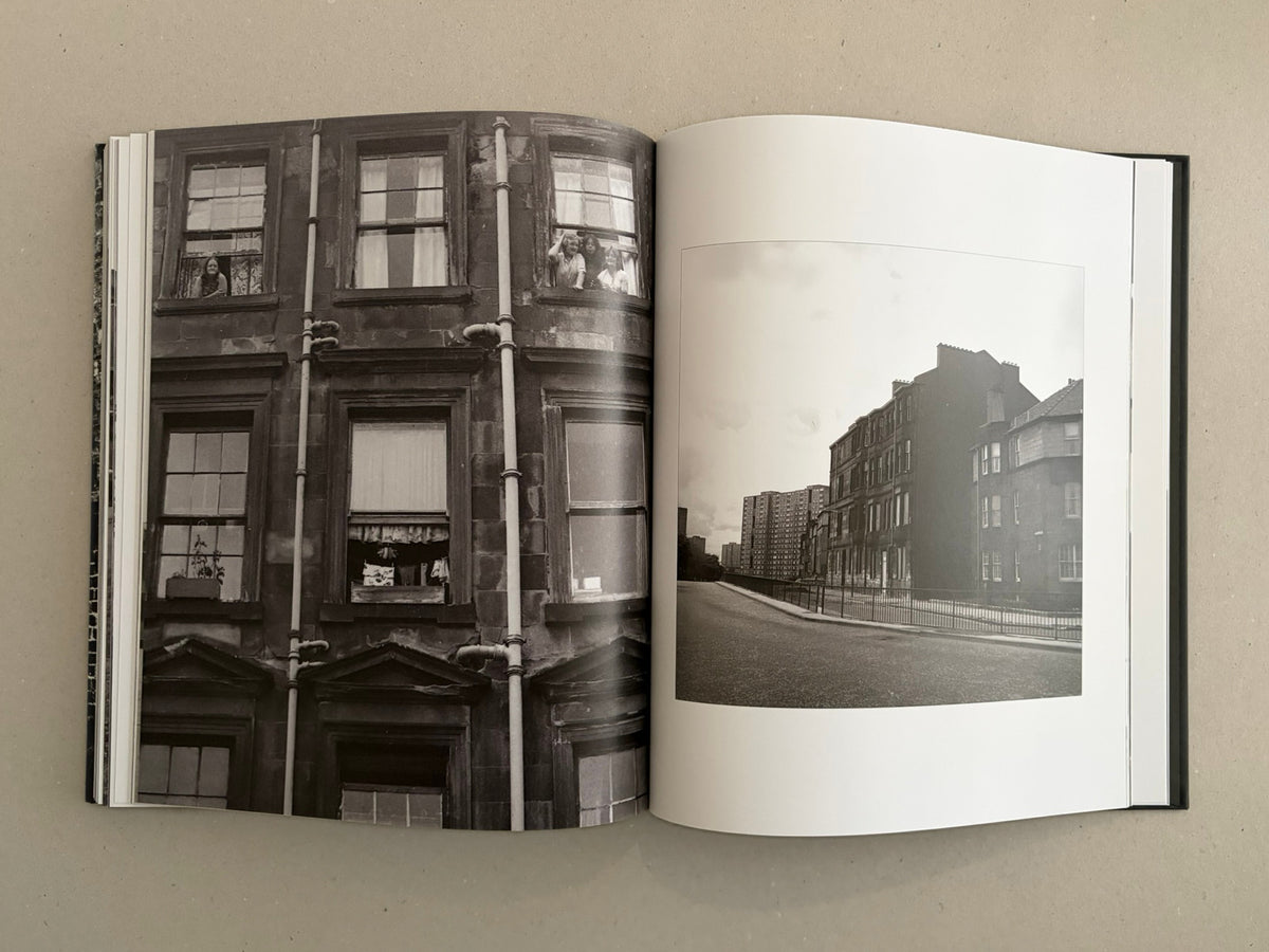 Open spread of Gorbals by Peter Christopherson, showing black-and-white photographs of tenement buildings.