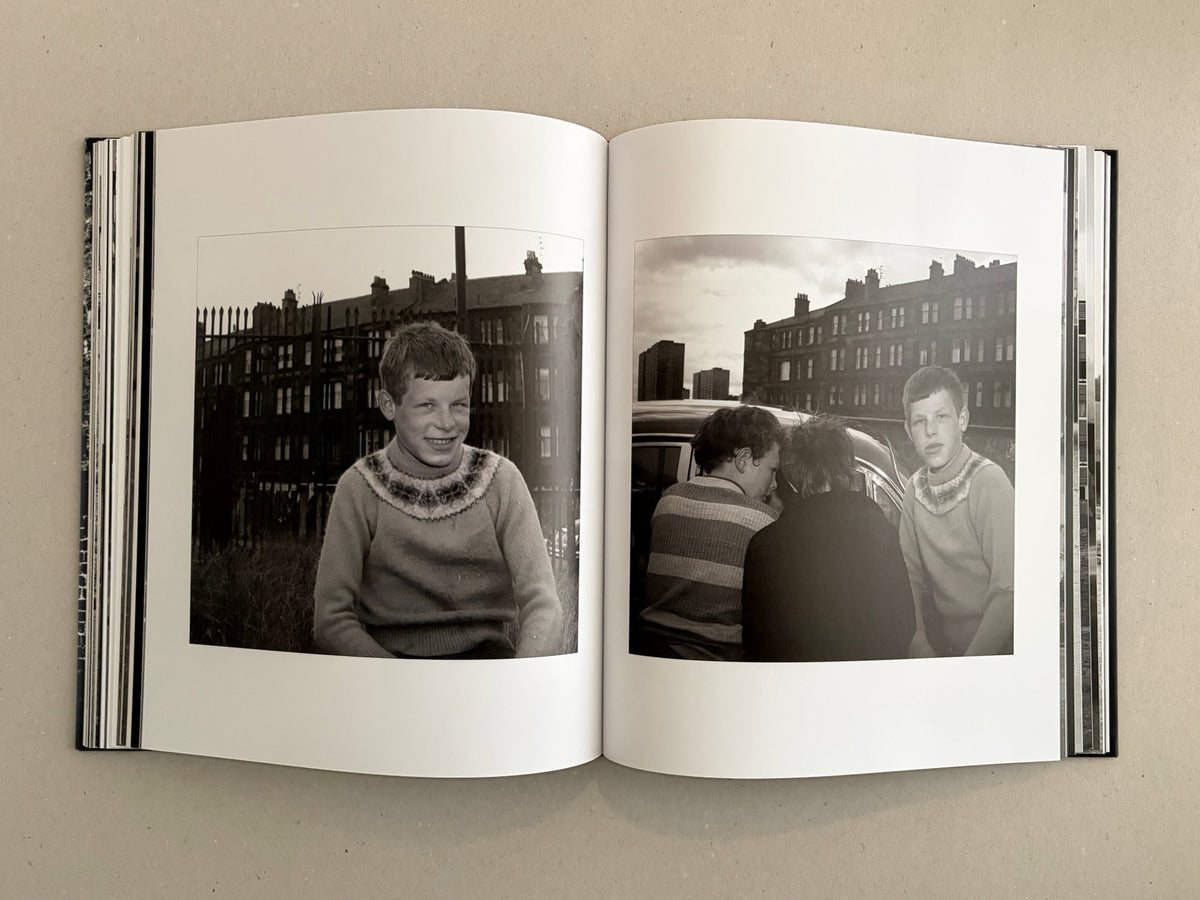 Open spread of Gorbals – Peter Christopherson showing two black-and-white photographs on white pages.