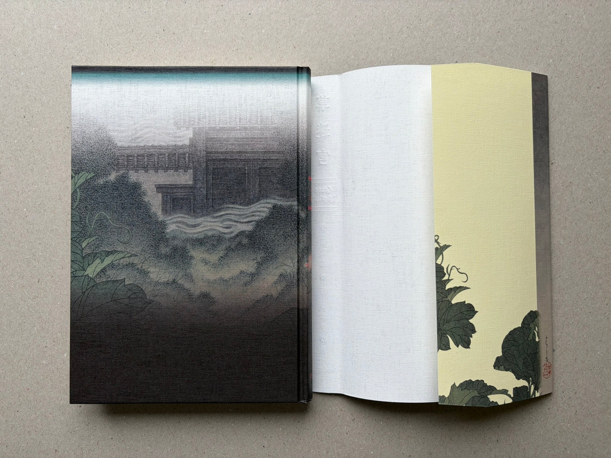 Grass Labyrinth by Takato Yamamoto, open to the endpapers and signed title page