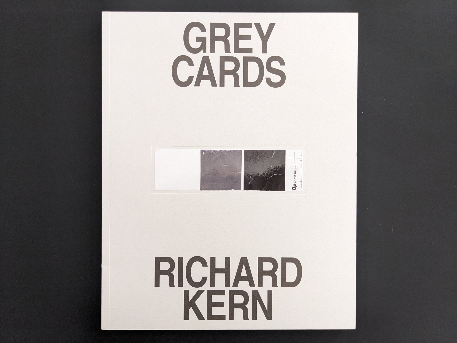 Front cover of Grey Cards by Richard Kern with tipped-in grey card, first edition 2025
