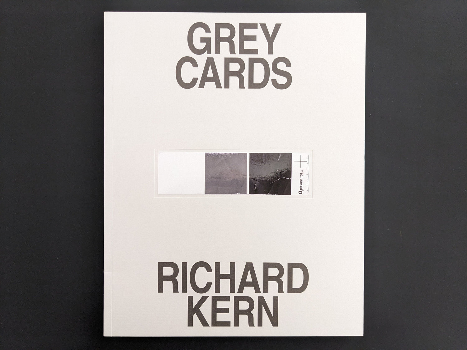 Front cover of Grey Cards by Richard Kern, with a tipped-in grey card and Friend Editions imprint