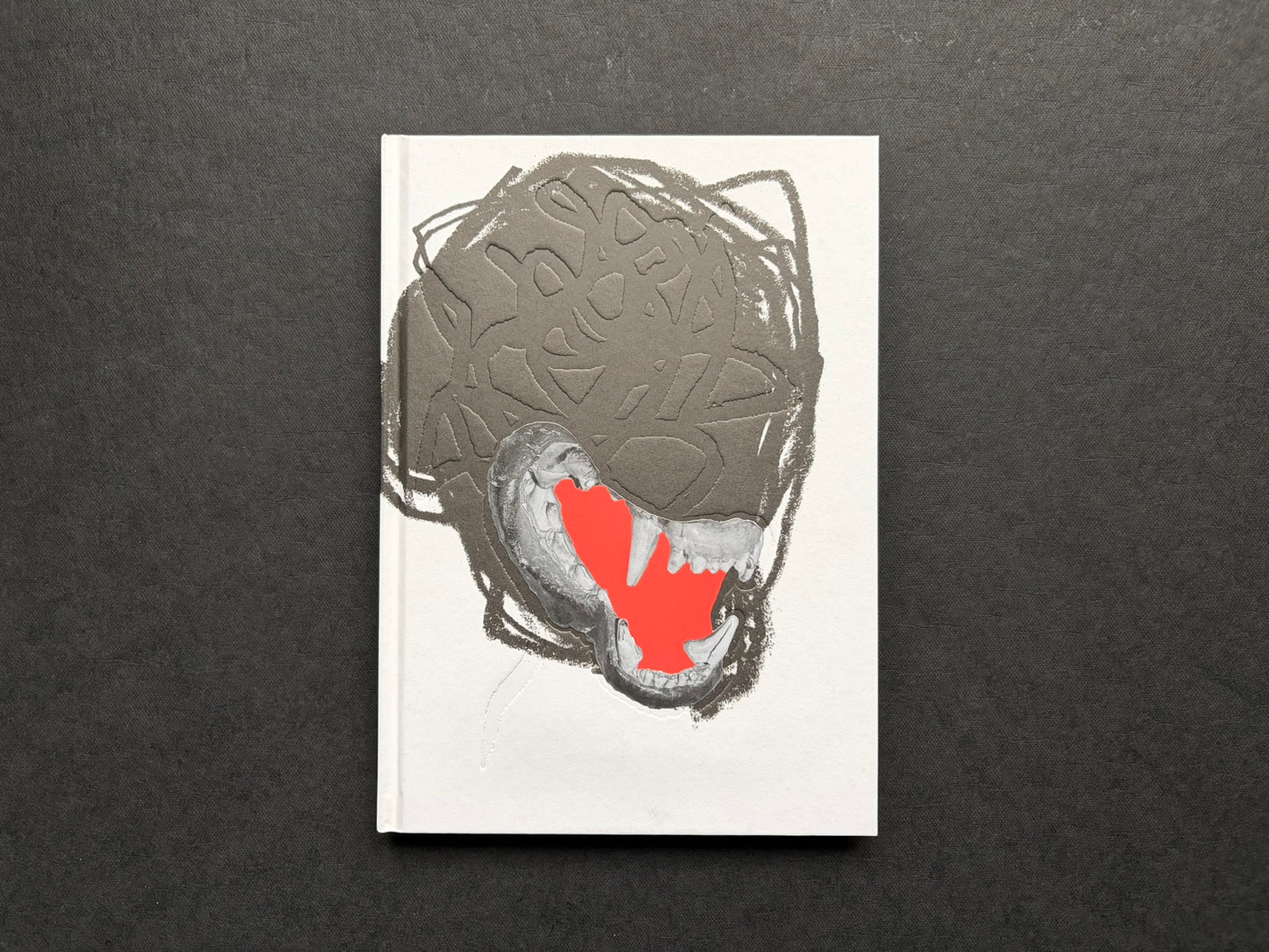 Gut Feeling by Kristina Rozhkova, front cover on a dark fabric background