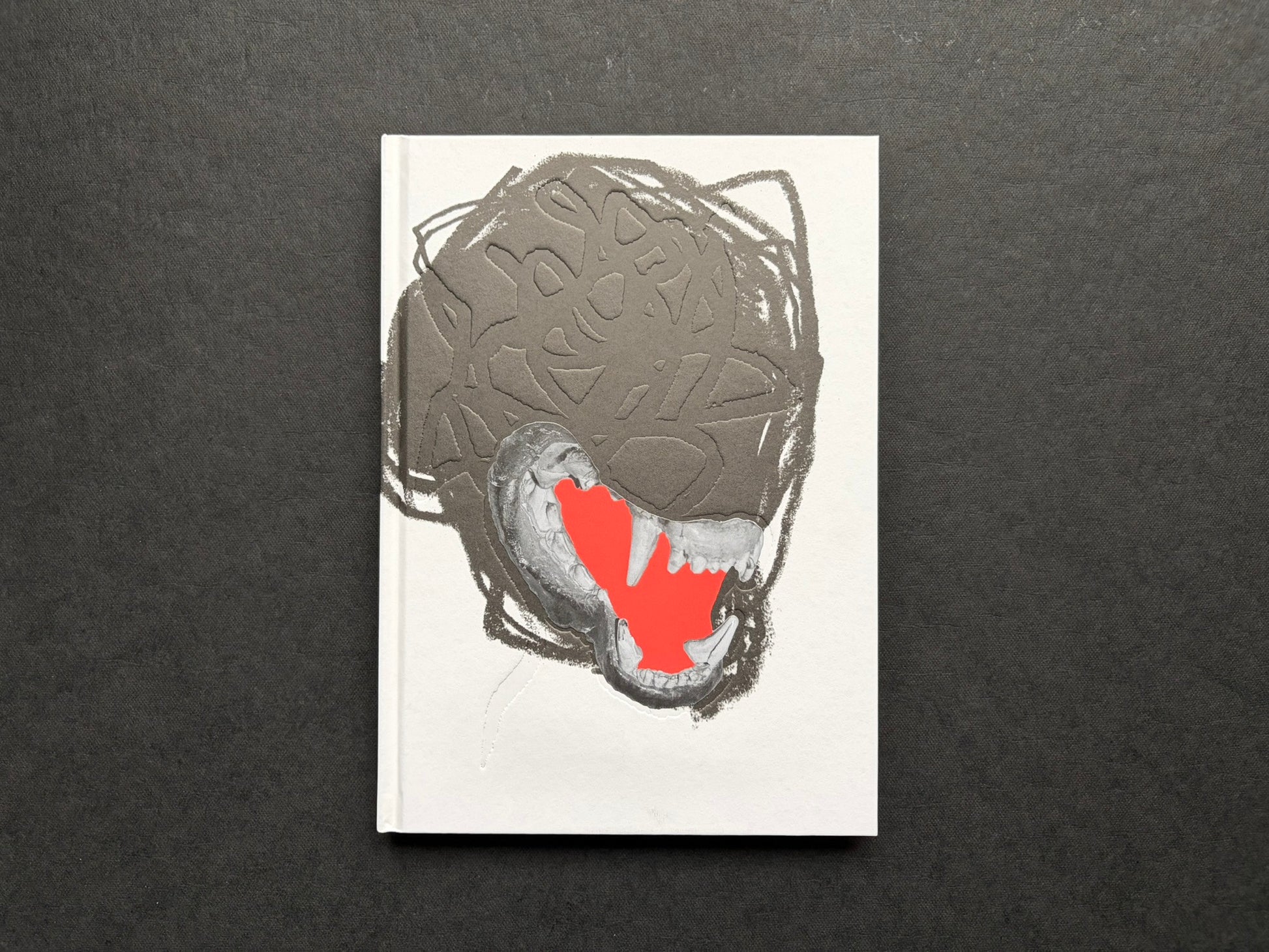 Gut Feeling by Kristina Rozhkova, front cover on a dark fabric background