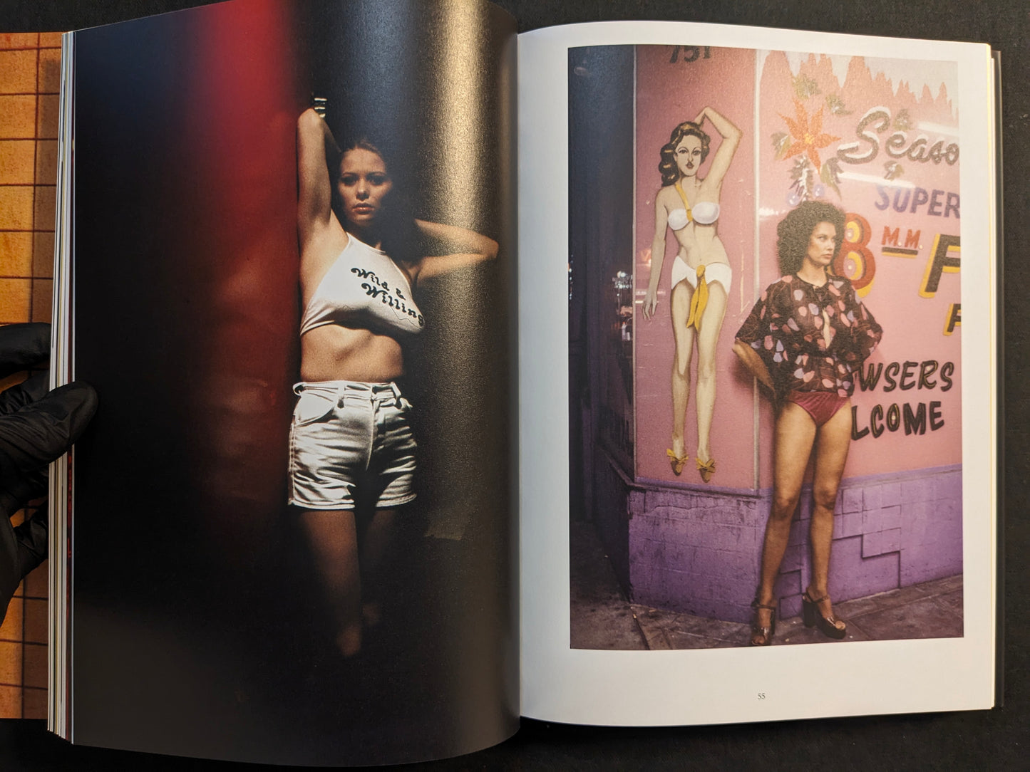 Interior spread with color photographs of performers and nightlife scenes (includes nudity) in “HARDCORE (dust jacket)”.
