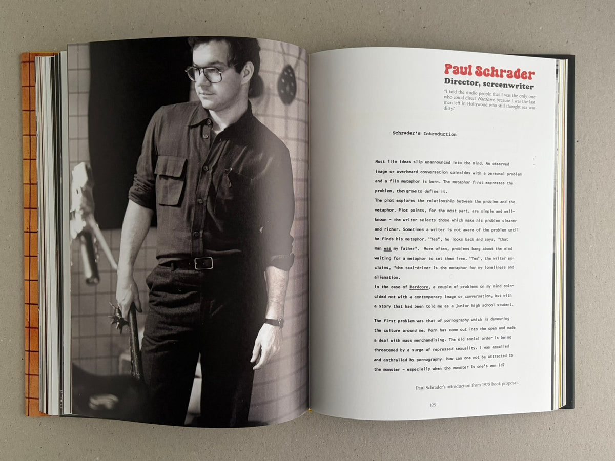 Open spread of HARDCORE (Dust Jacket) – Eric Kroll, showing a black-and-white portrait on the left page and a text page headed "Paul Schrader" on the right.
