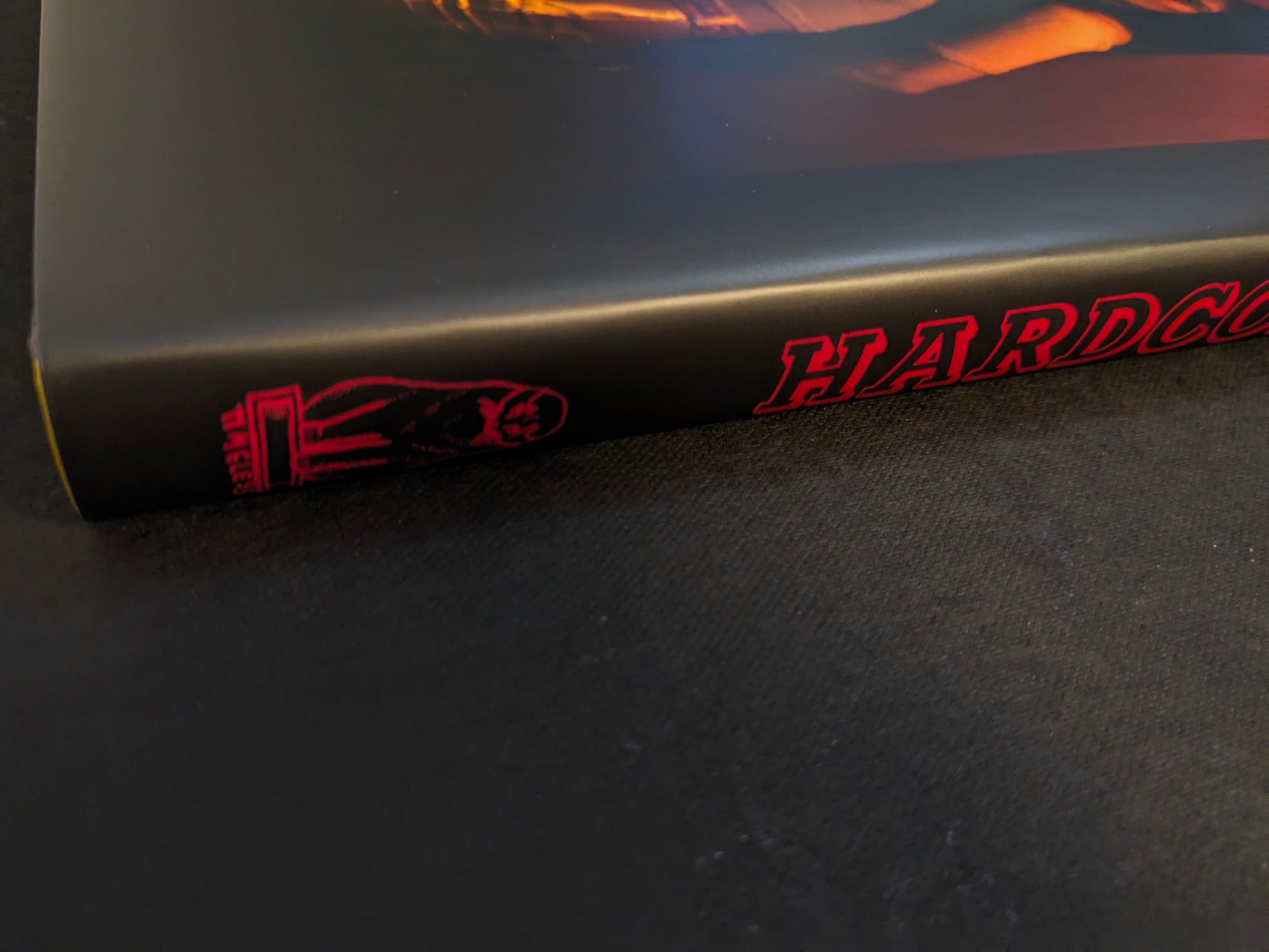 Close-up of the spine and title lettering on “HARDCORE” by Eric Kroll (Timeless Edition).