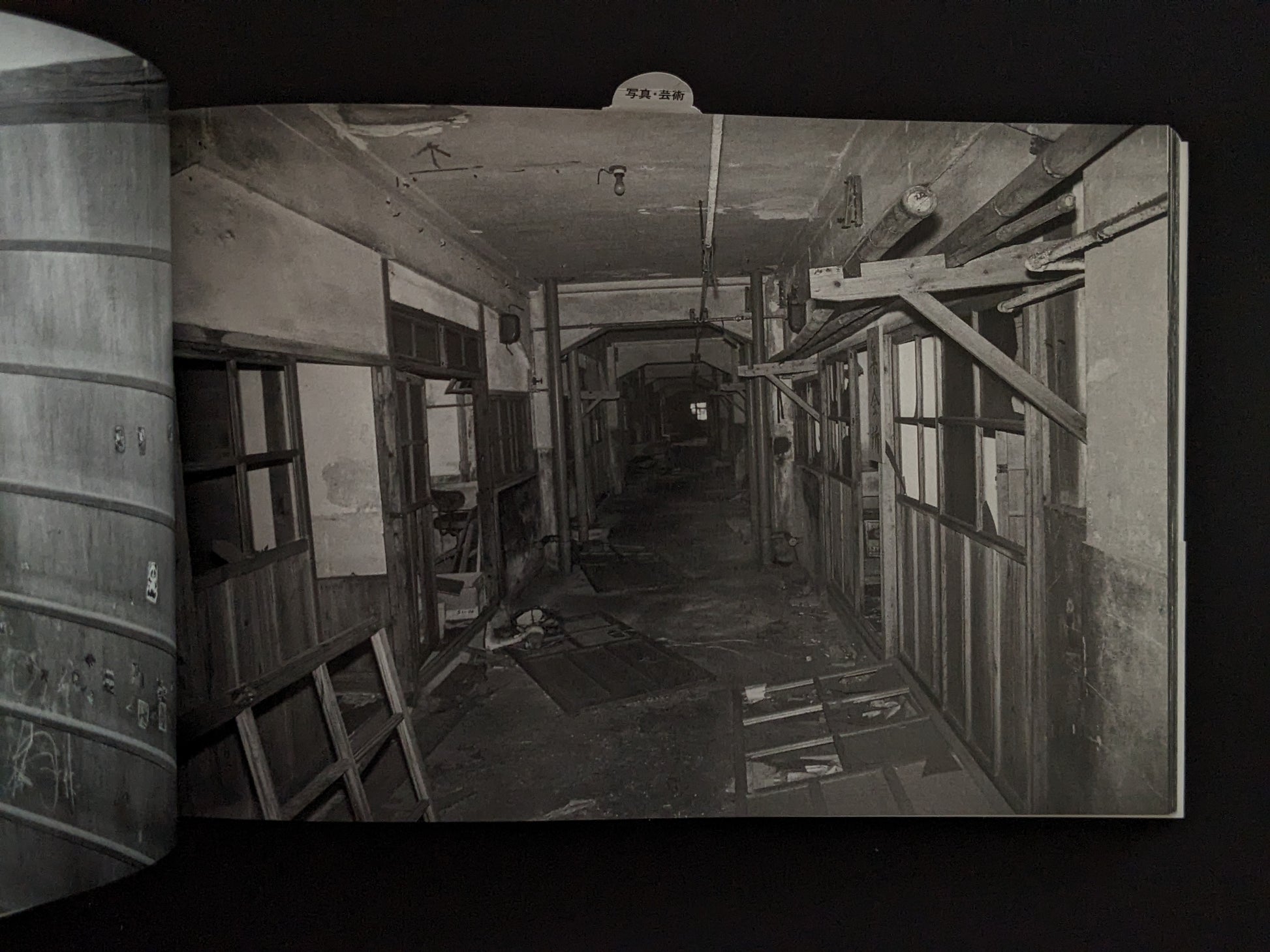 Dark corridor of abandoned buildings photographed on Hashima Island