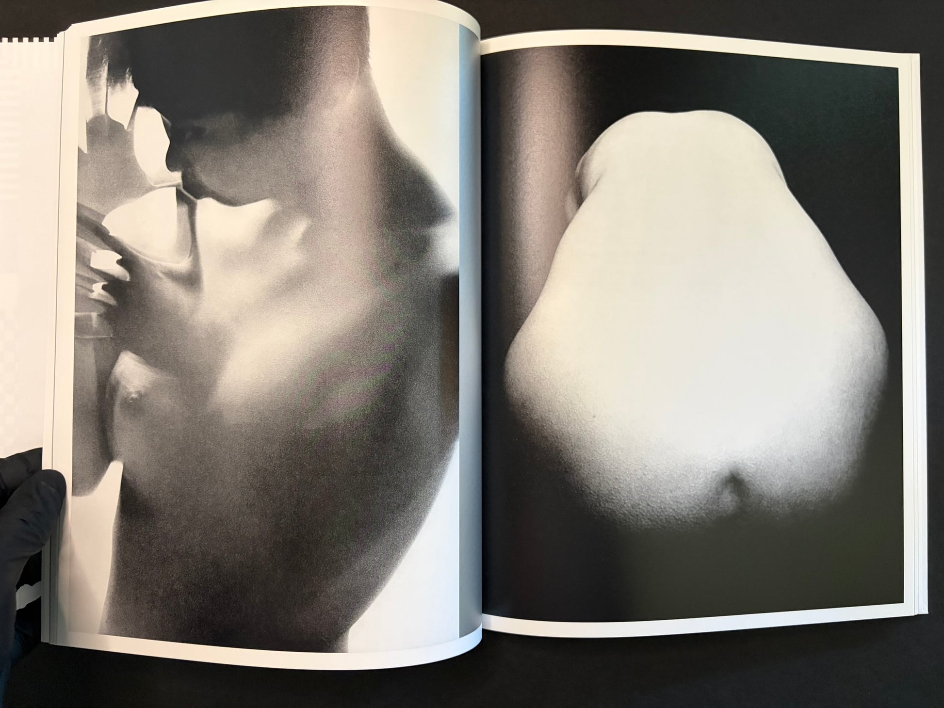 Open spread with a close-up portrait on the left and a blurred nighttime street scene on the right