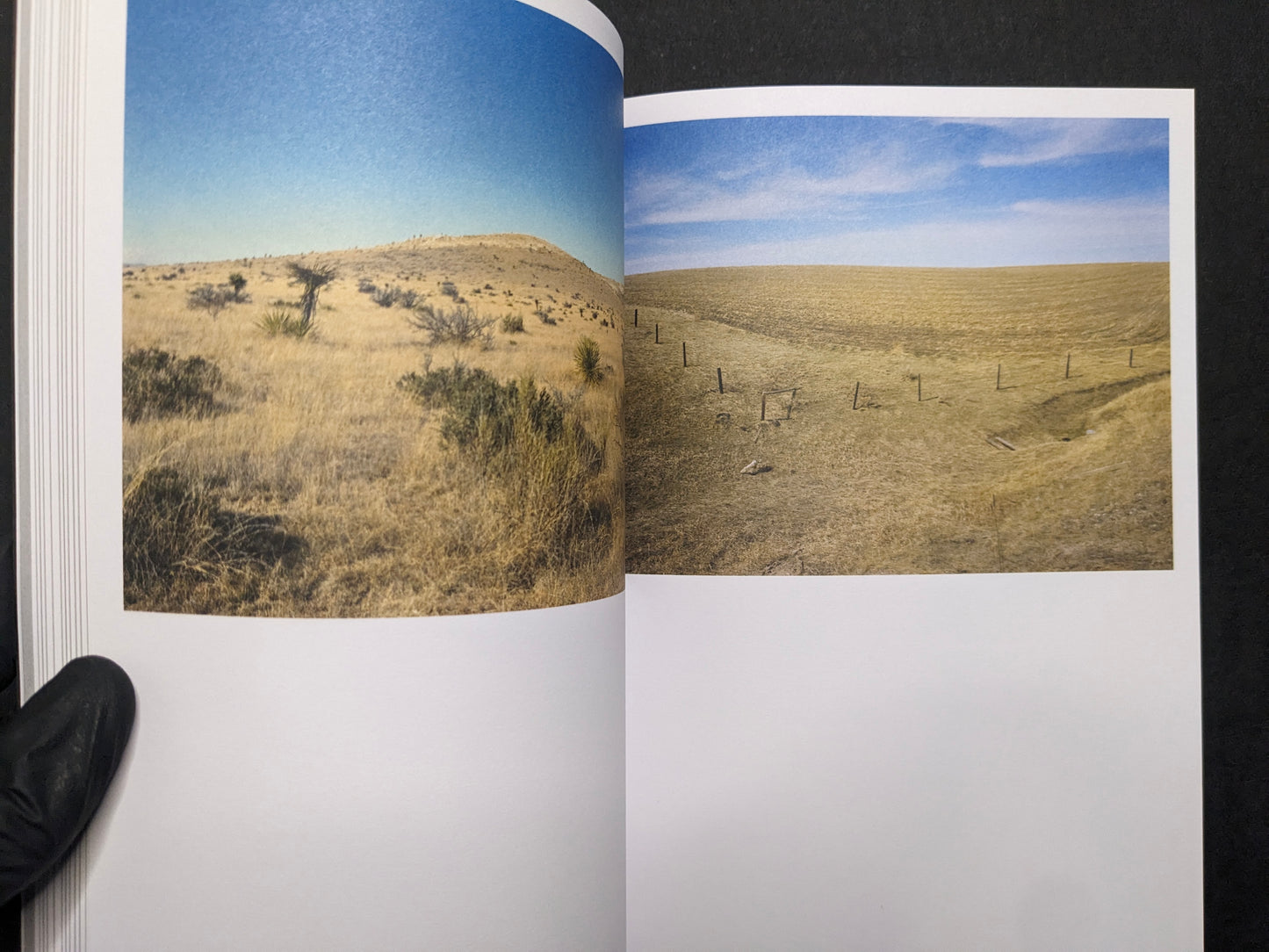 Inside spread from Hotshoe Issue 214 showing Stephen Shore color landscape with dry hills, open sky, and fence posts.